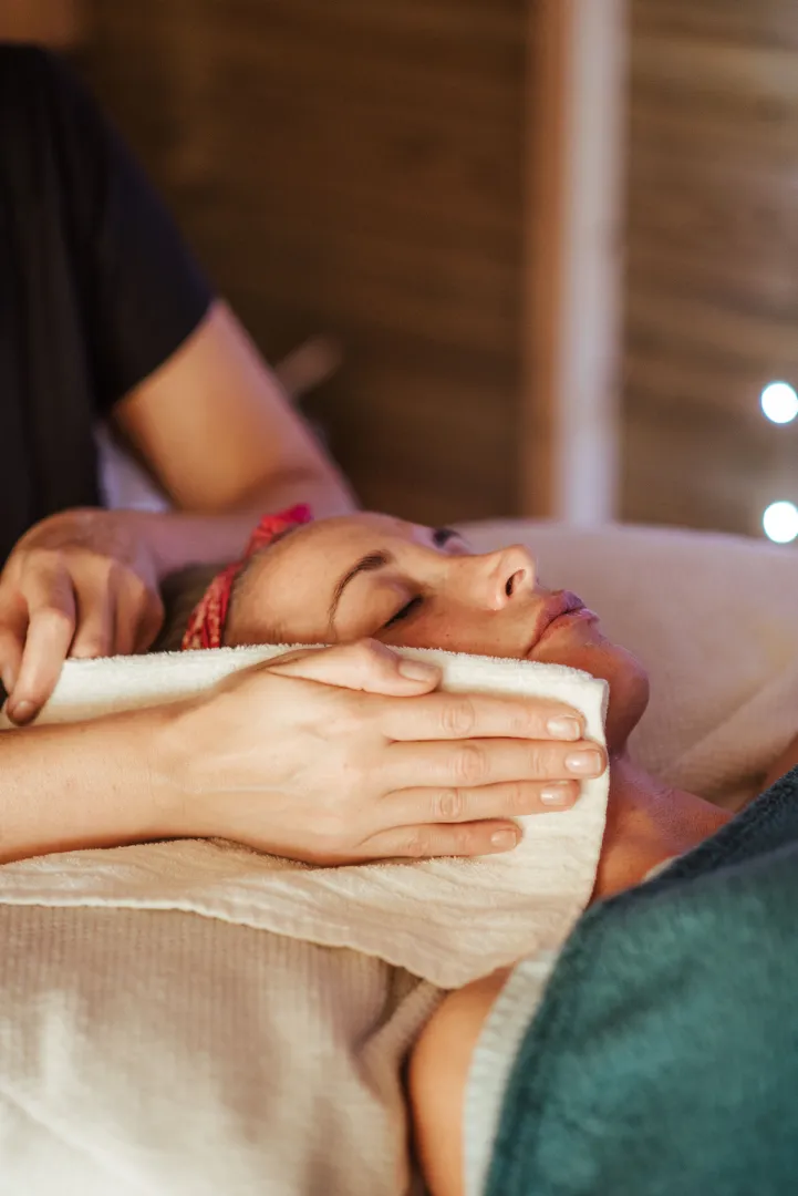 Client receiving a professional facial treatment